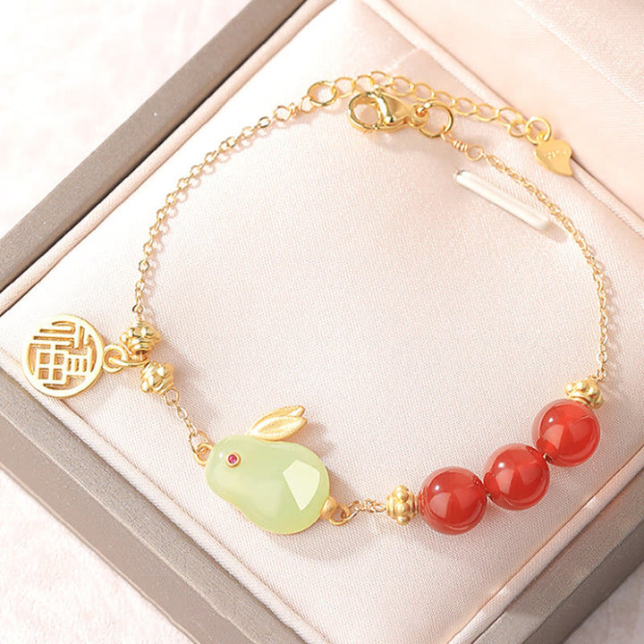 Pulsera con hebilla de cadena con símbolo de la suerte de conejo y jade hetiano con cuentas de ágata roja y Buddha Stones