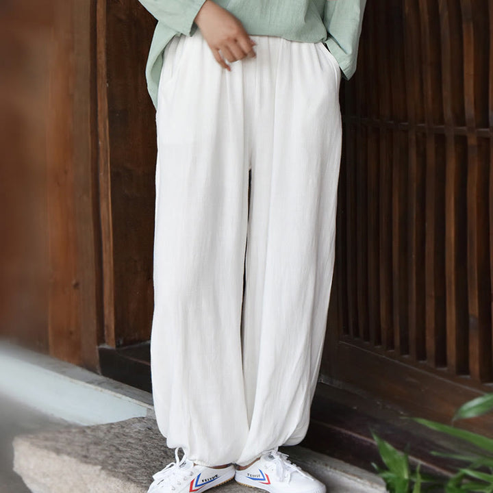 Pantalones de lino holgados informales con bolsillos y diseño de Buddha Stones para mujer