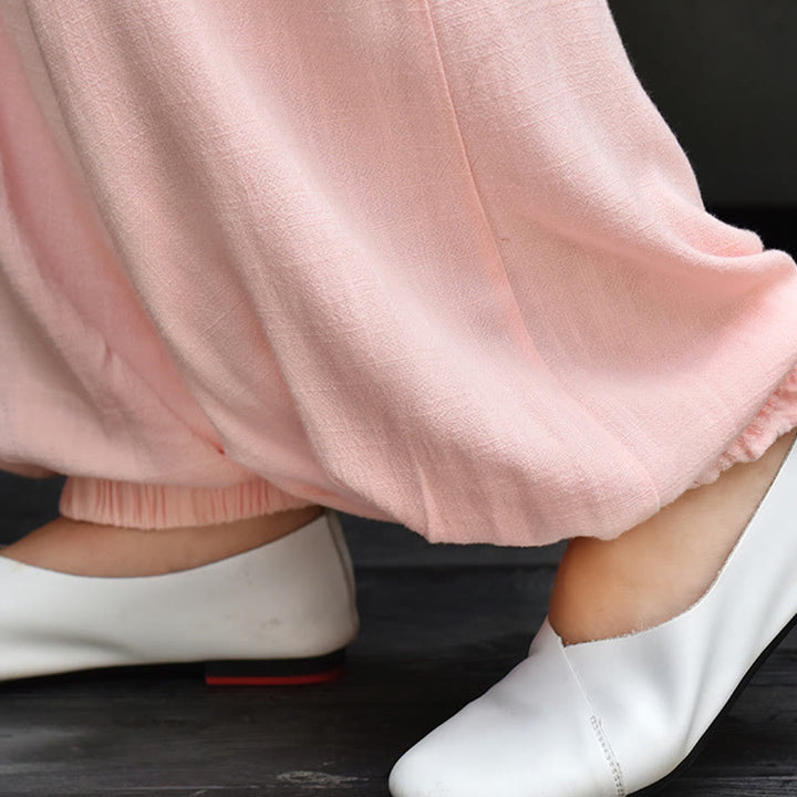 Pantalones de lino holgados informales con bolsillos y diseño de Buddha Stones para mujer