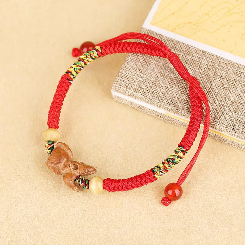 Pulsera de la suerte hecha a mano con hilo rojo del zodíaco chino y Buddha Stones en madera de durazno