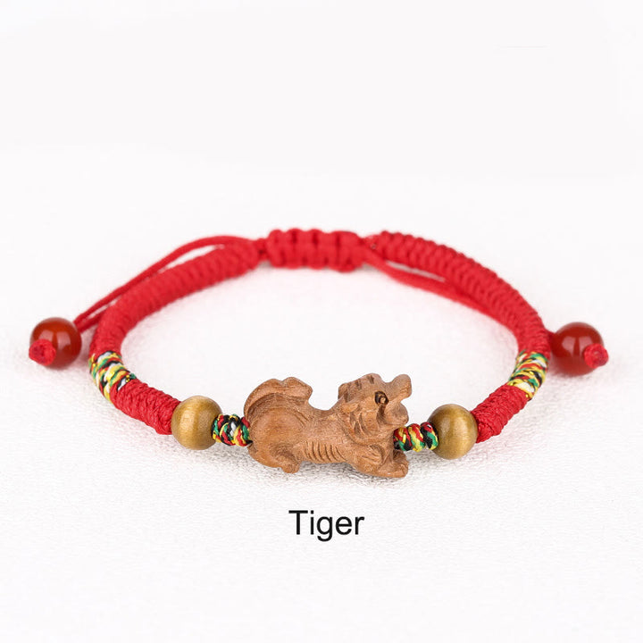 Pulsera de la suerte hecha a mano con hilo rojo del zodíaco chino y Buddha Stones en madera de durazno