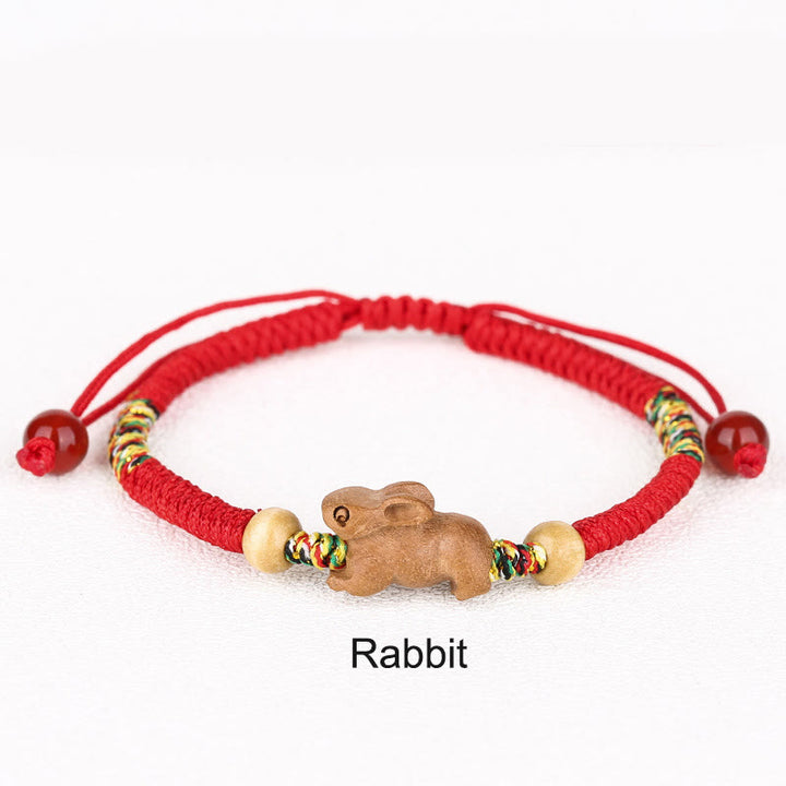 Pulsera de la suerte hecha a mano con hilo rojo del zodíaco chino y Buddha Stones en madera de durazno