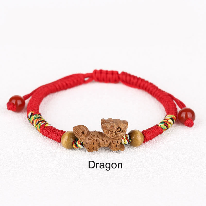 Pulsera de la suerte hecha a mano con hilo rojo del zodíaco chino y Buddha Stones en madera de durazno