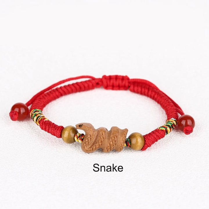 Pulsera de la suerte hecha a mano con hilo rojo del zodíaco chino y Buddha Stones en madera de durazno