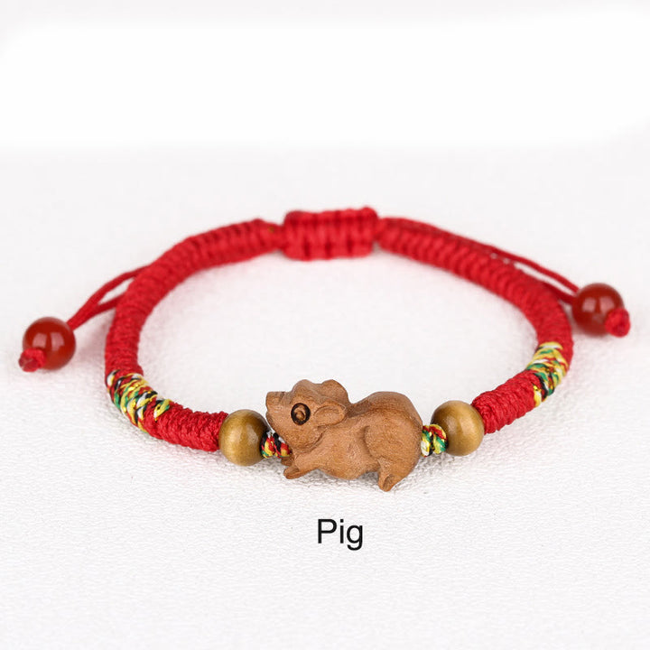 Pulsera de la suerte hecha a mano con hilo rojo del zodíaco chino y Buddha Stones en madera de durazno