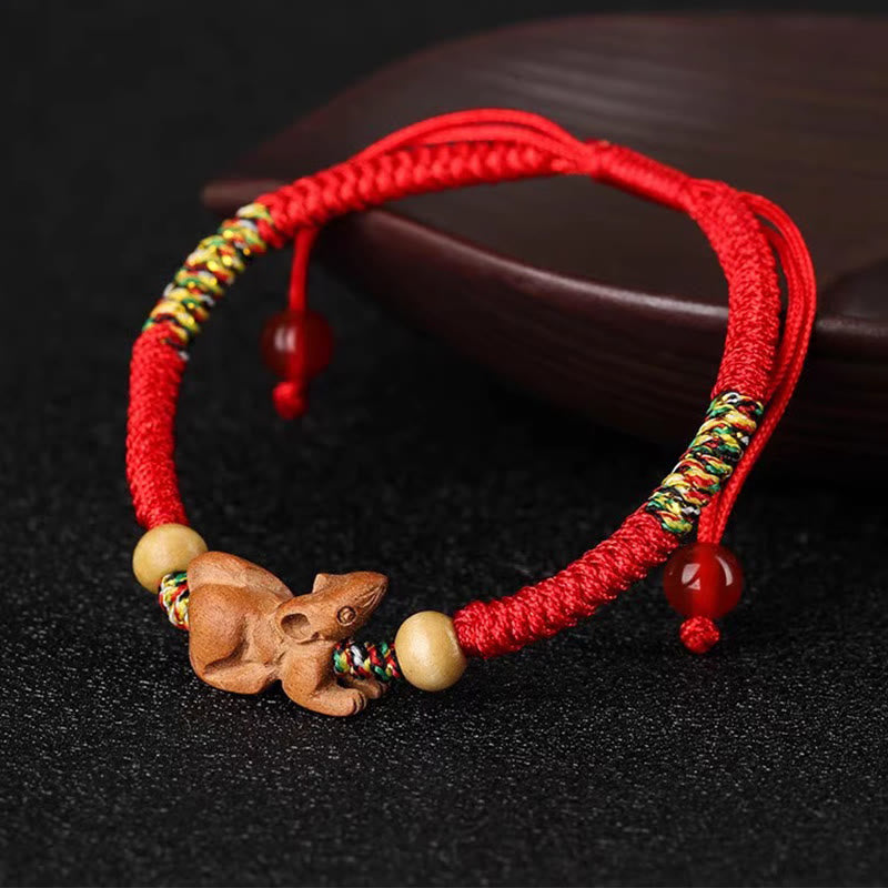 Pulsera de la suerte hecha a mano con hilo rojo del zodíaco chino y Buddha Stones en madera de durazno