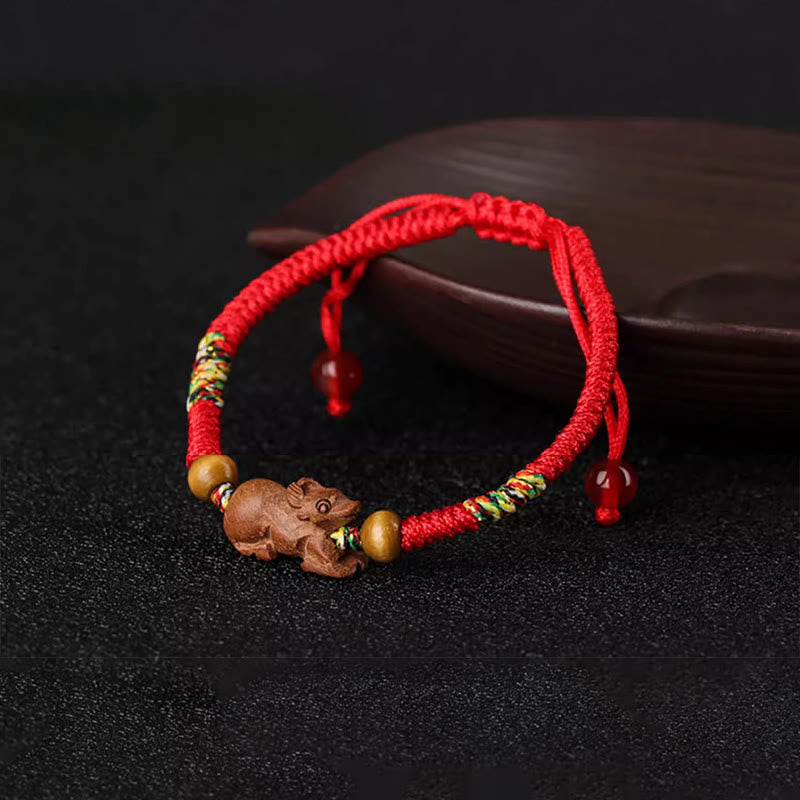 Pulsera de la suerte hecha a mano con hilo rojo del zodíaco chino y Buddha Stones en madera de durazno