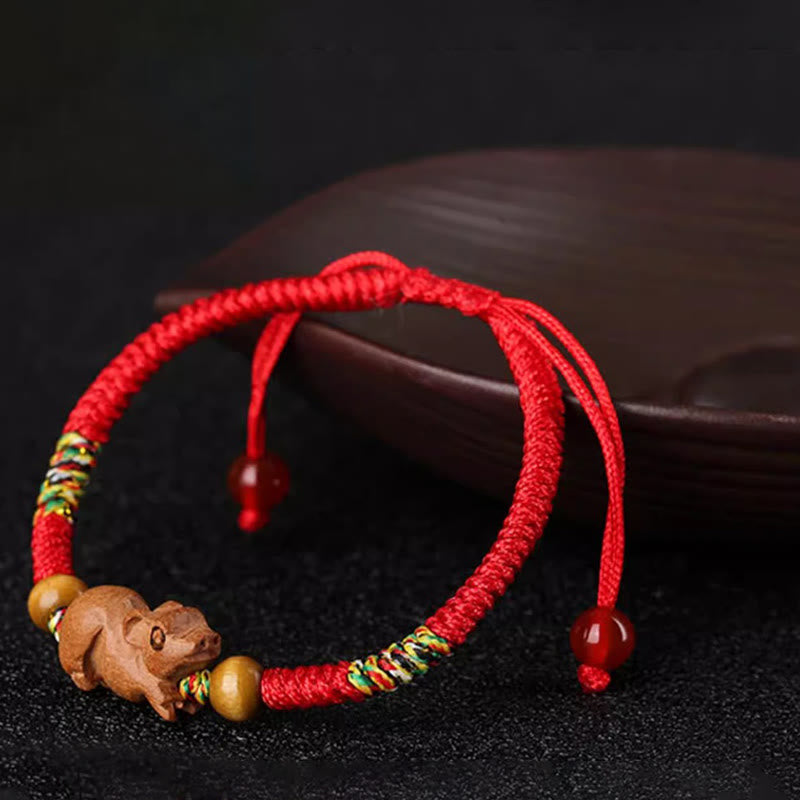 Pulsera de la suerte hecha a mano con hilo rojo del zodíaco chino y Buddha Stones en madera de durazno