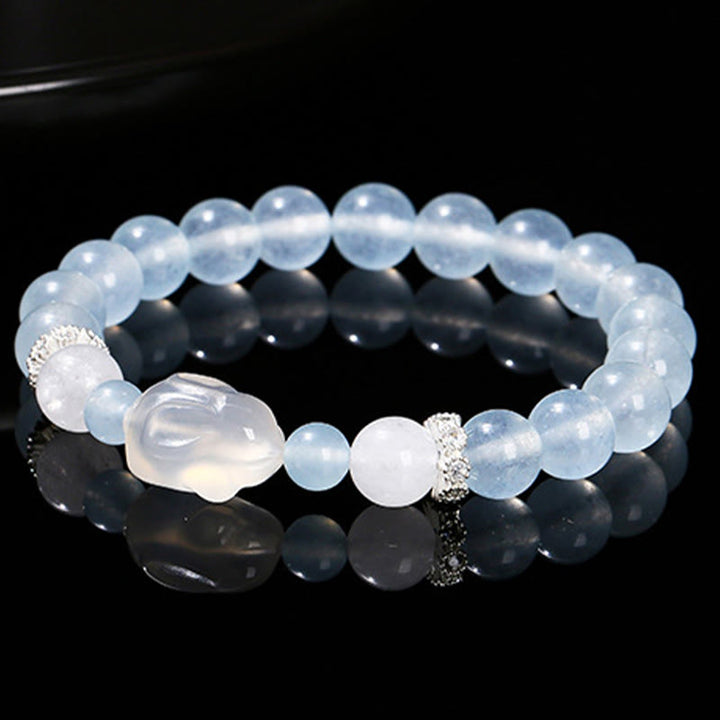 Pulsera de equilibrio emocional de conejo con ágata blanca y calcedonia azul de Buddha Stones