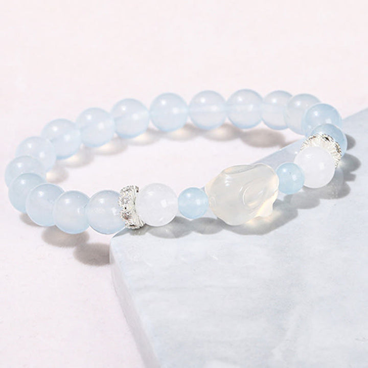 Pulsera de equilibrio emocional de conejo con ágata blanca y calcedonia azul de Buddha Stones