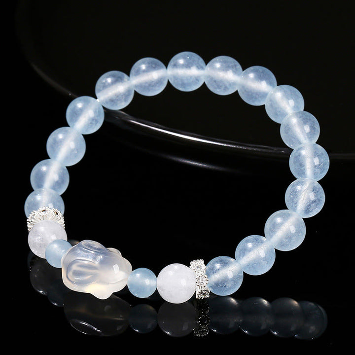 Pulsera de equilibrio emocional de conejo con ágata blanca y calcedonia azul de Buddha Stones