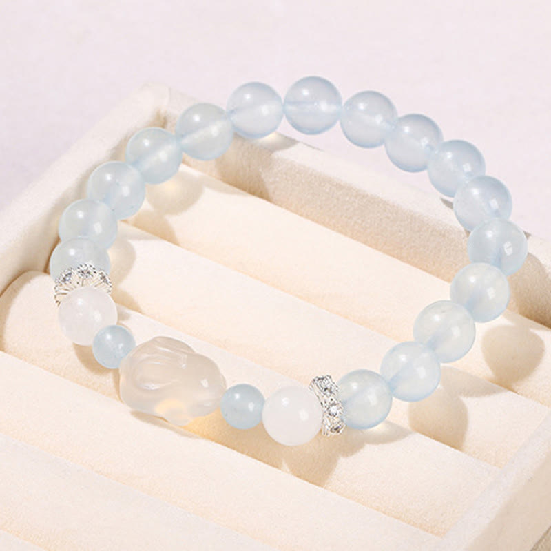 Pulsera de equilibrio emocional de conejo con ágata blanca y calcedonia azul de Buddha Stones