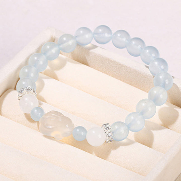 Pulsera de equilibrio emocional de conejo con ágata blanca y calcedonia azul de Buddha Stones