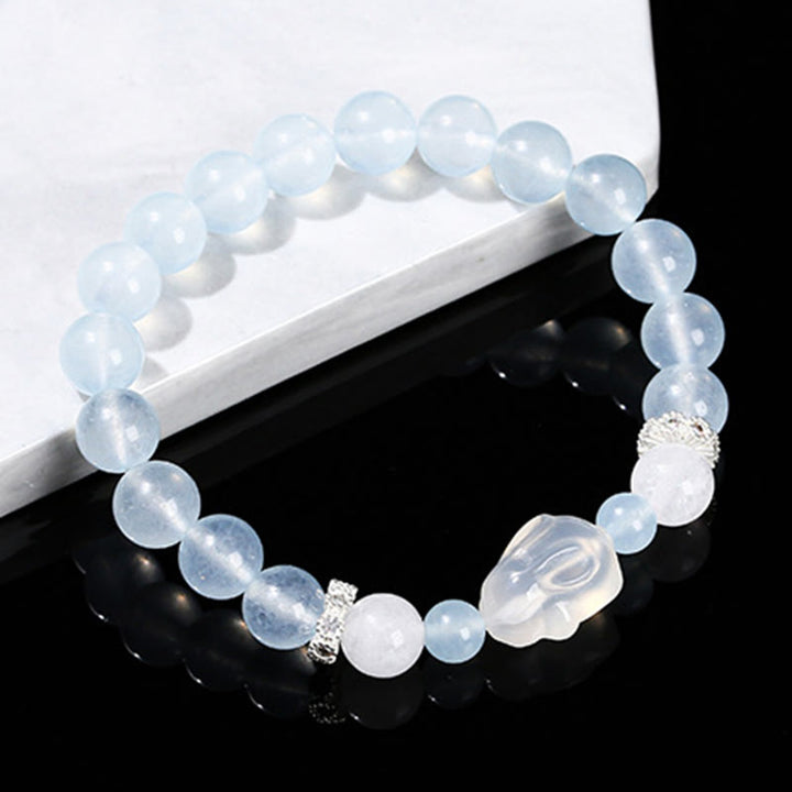 Pulsera de equilibrio emocional de conejo con ágata blanca y calcedonia azul de Buddha Stones