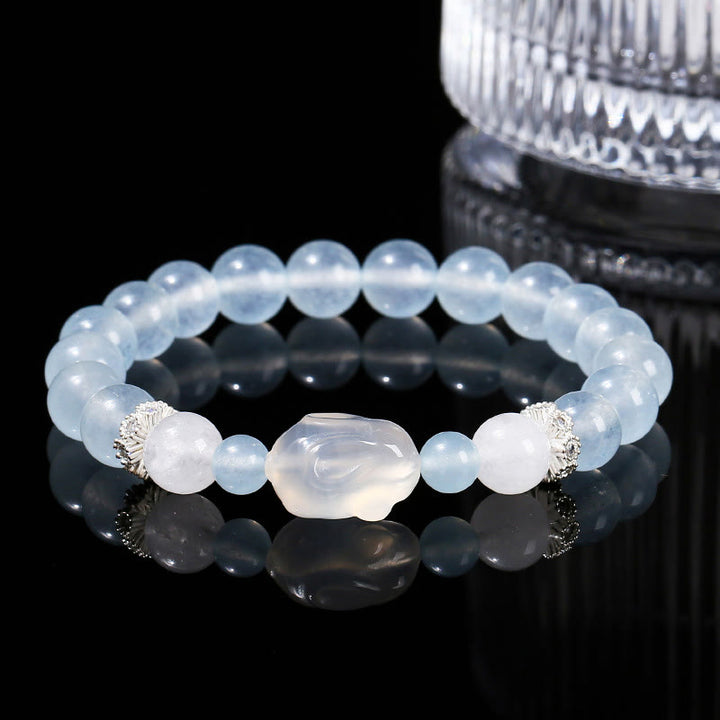 Pulsera de equilibrio emocional de conejo con ágata blanca y calcedonia azul de Buddha Stones