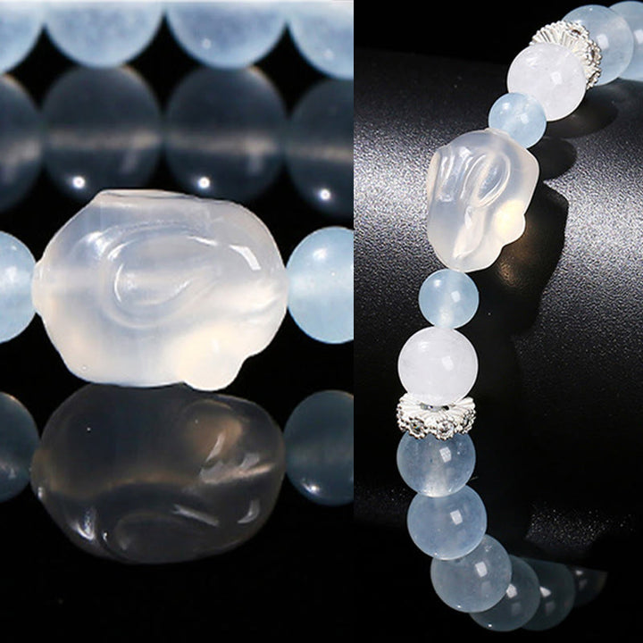 Pulsera de equilibrio emocional de conejo con ágata blanca y calcedonia azul de Buddha Stones