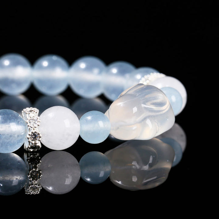 Pulsera de equilibrio emocional de conejo con ágata blanca y calcedonia azul de Buddha Stones