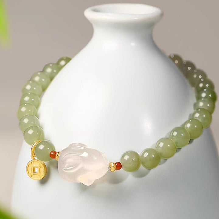 Pulsera de la suerte con monedas de cobre y conejo de ágata y jade hetiano natural de Buddha Stones