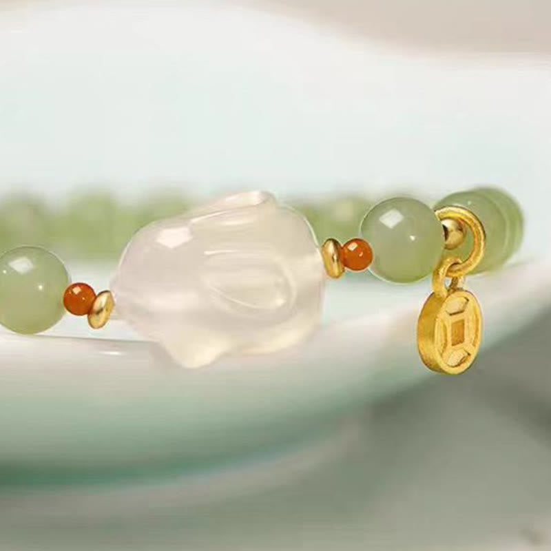 Pulsera de la suerte con monedas de cobre y conejo de ágata y jade hetiano natural de Buddha Stones