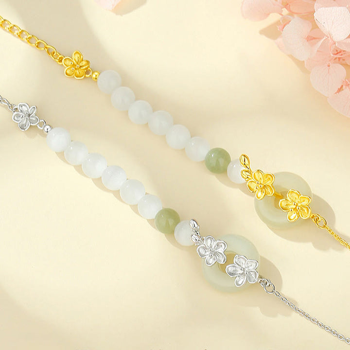 Pulsera de la suerte con hebilla de paz y flor de durazno de jade hetiano natural de plata esterlina 999 con Buddha Stones
