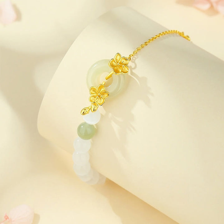 Pulsera de la suerte con hebilla de paz y flor de durazno de jade hetiano natural de plata esterlina 999 con Buddha Stones