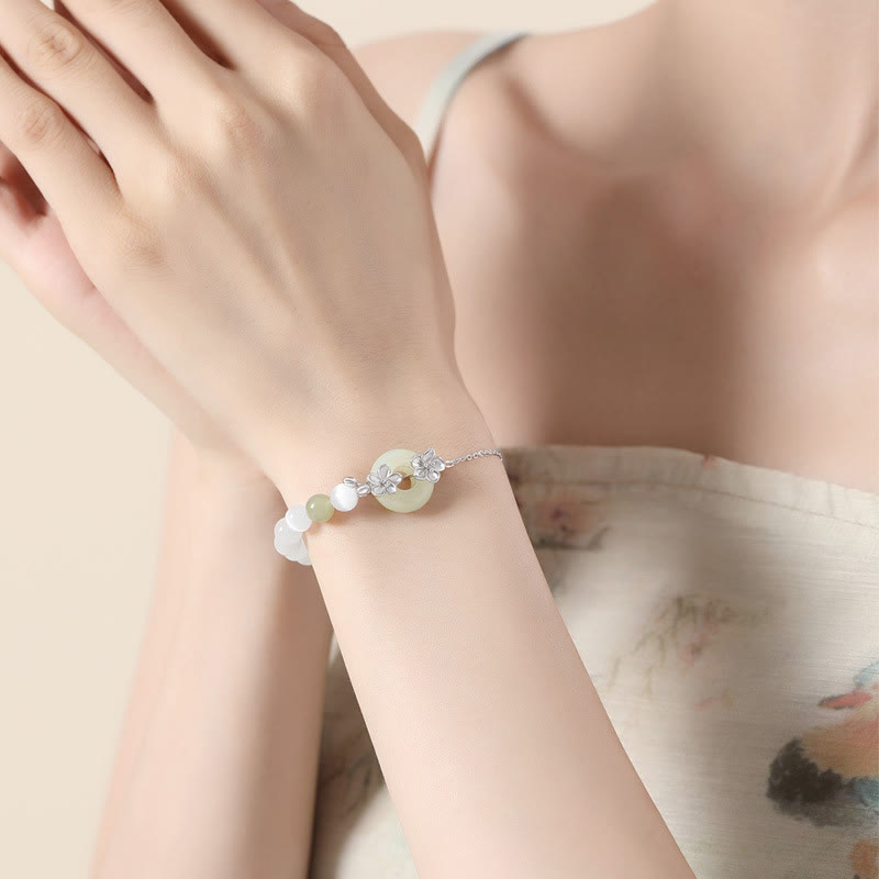 Pulsera de la suerte con hebilla de paz y flor de durazno de jade hetiano natural de plata esterlina 999 con Buddha Stones