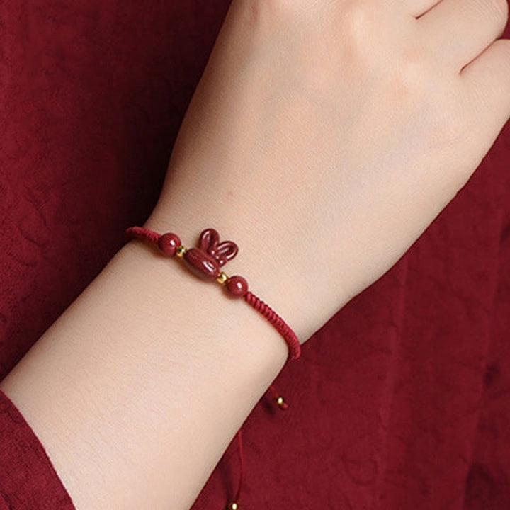 Pulsera de cuerda roja hecha a mano con Buddha Stones, cinabrio, zodíaco chino, conejo de la suerte