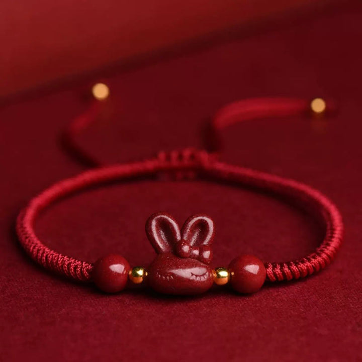 Pulsera de cuerda roja hecha a mano con Buddha Stones, cinabrio, zodíaco chino, conejo de la suerte