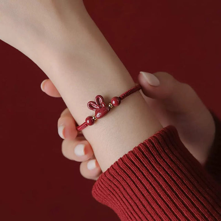 Pulsera de cuerda roja hecha a mano con Buddha Stones, cinabrio, zodíaco chino, conejo de la suerte
