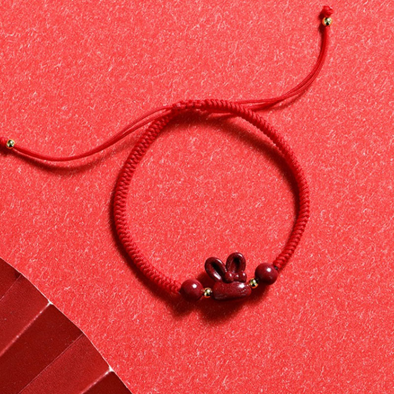Pulsera de cuerda roja hecha a mano con Buddha Stones, cinabrio, zodíaco chino, conejo de la suerte