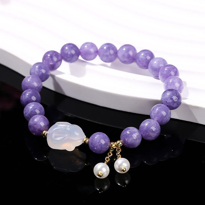Pulsera de cuentas curativas de conejo de calcedonia y aguamarina morada natural de Buddha Stones