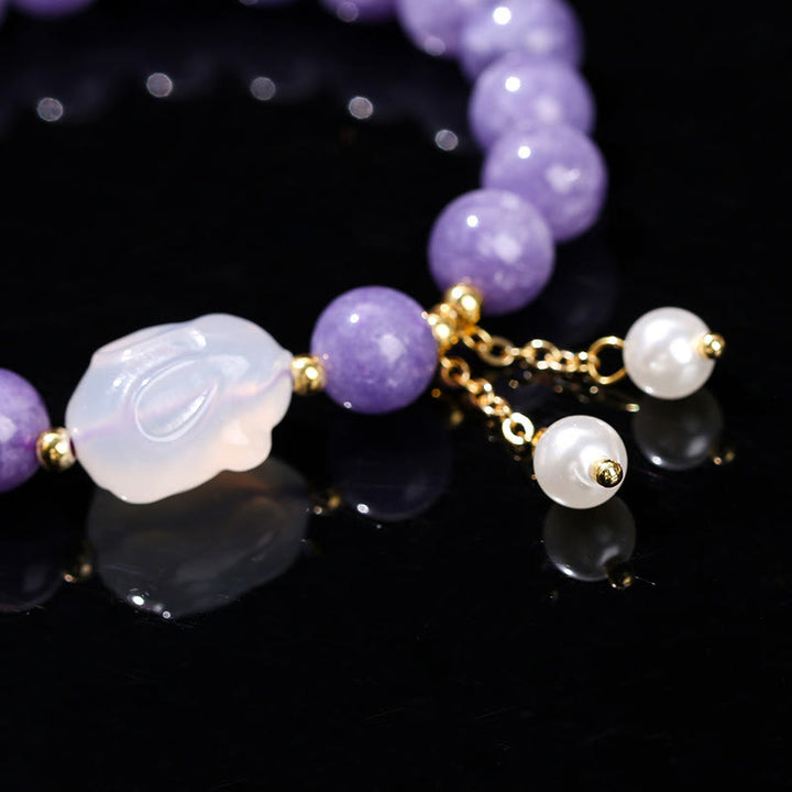 Pulsera de cuentas curativas de conejo de calcedonia y aguamarina morada natural de Buddha Stones
