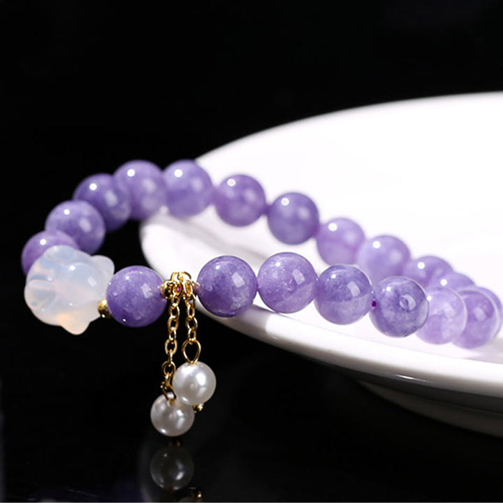 Pulsera de cuentas curativas de conejo de calcedonia y aguamarina morada natural de Buddha Stones