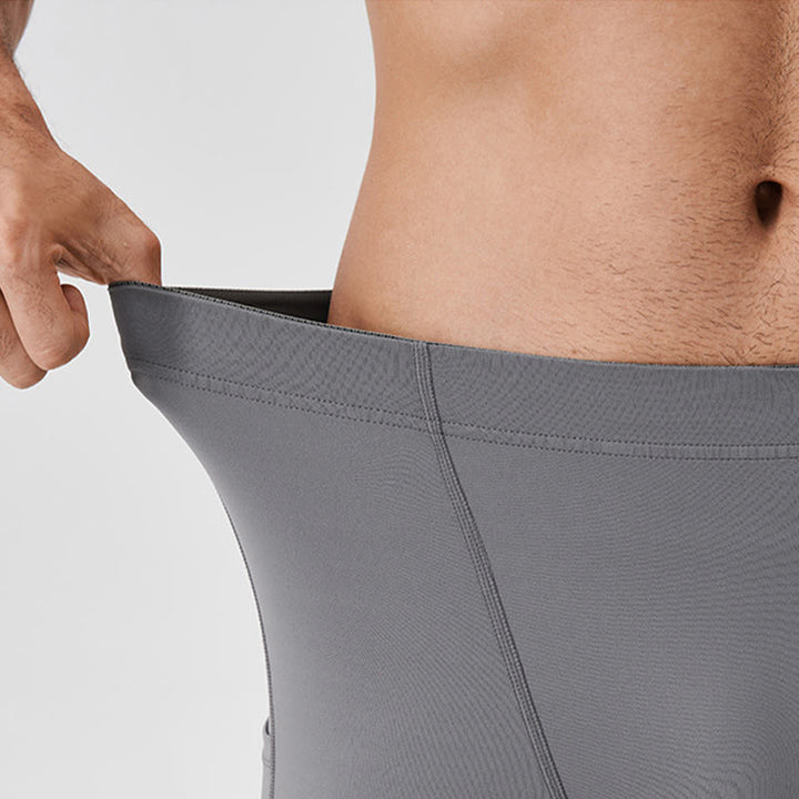 Leggings deportivos transpirables elásticos de cintura alta de color sólido con Buddha Stones para hombre con bolsillo trasero con cremallera