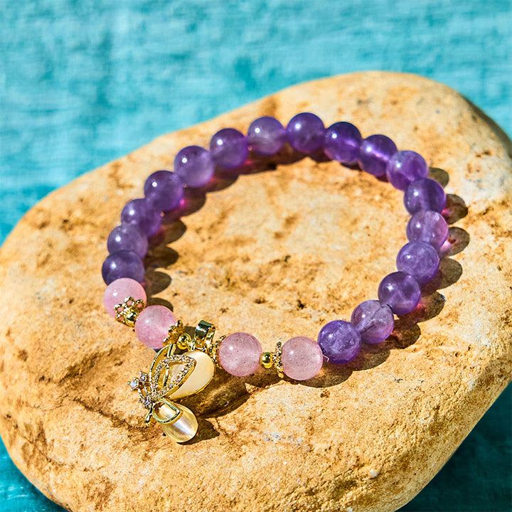 Pulsera con dijes de mariposa curativos de cristal de cuarzo fresa y amatista natural de Buddha Stones