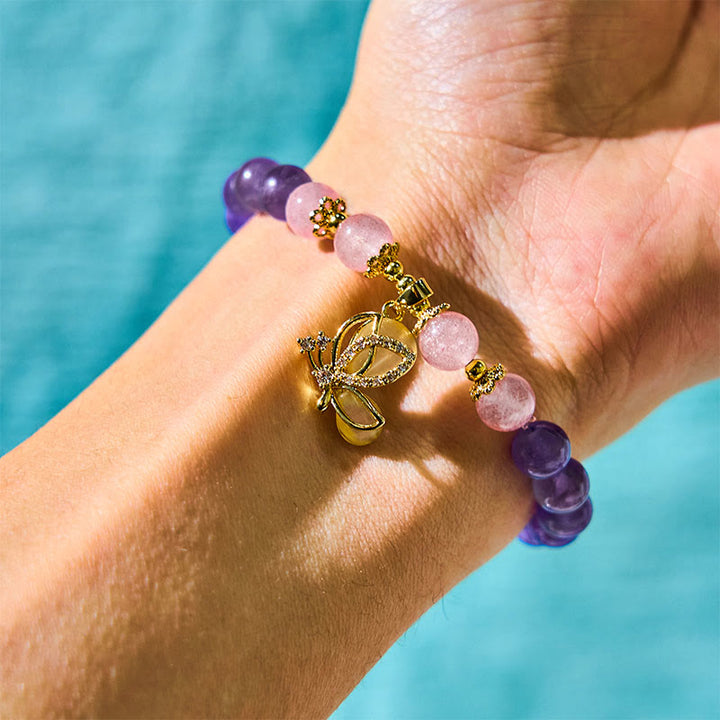 Pulsera con dijes de mariposa curativos de cristal de cuarzo fresa y amatista natural de Buddha Stones