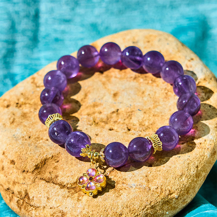Pulsera de comunicación con dije de trébol de cuatro hojas y amatista natural de Buddha Stones
