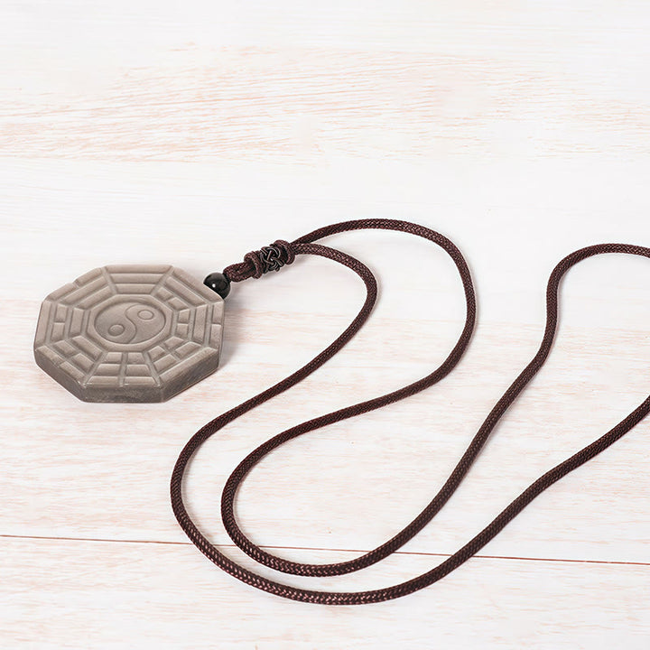 Collar con colgante de protección con símbolo Bagua Yin Yang, obsidiana y Buddha Stones con brillo plateado - image 4