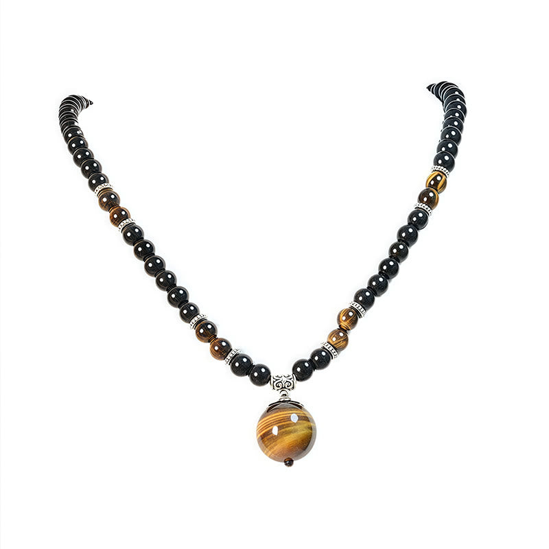 Collar con colgante de ojo de tigre y obsidiana negra con Buddha Stones para fortalecer