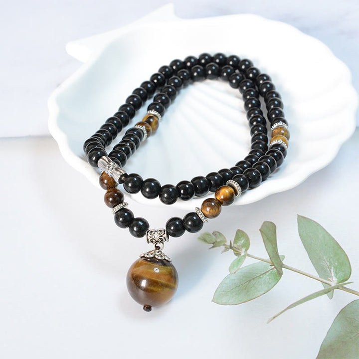 Collar con colgante de ojo de tigre y obsidiana negra con Buddha Stones para fortalecer