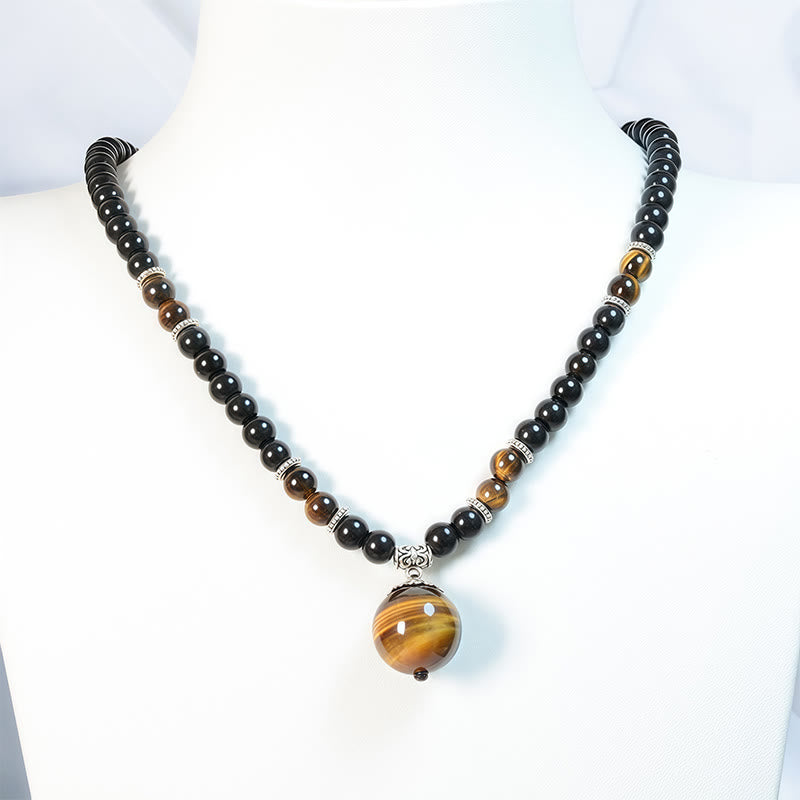 Collar con colgante de ojo de tigre y obsidiana negra con Buddha Stones para fortalecer