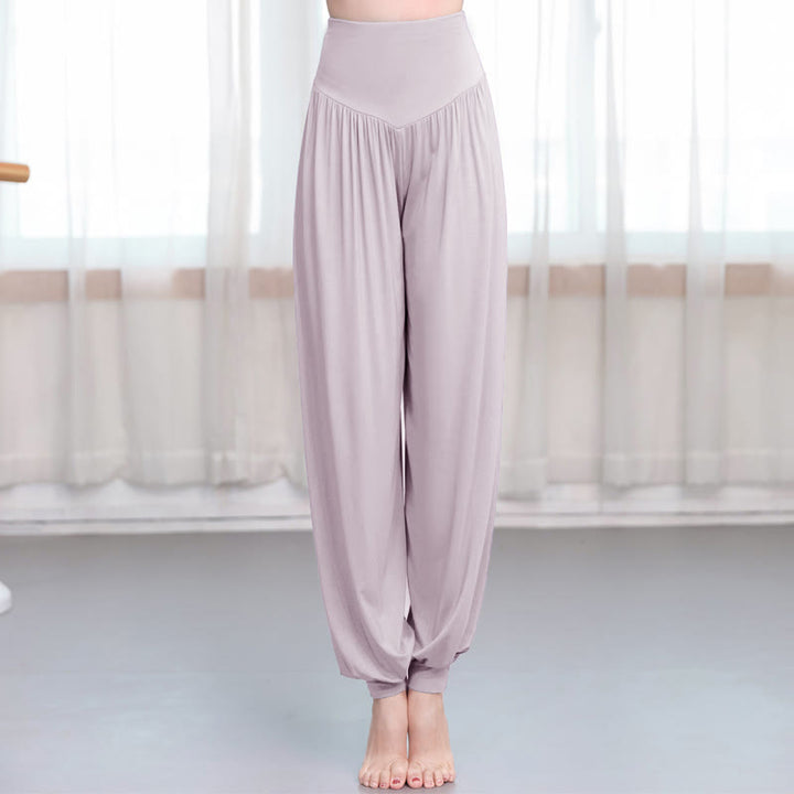 Pantalones de harén de danza de yoga modales sueltos de color liso con Buddha Stones