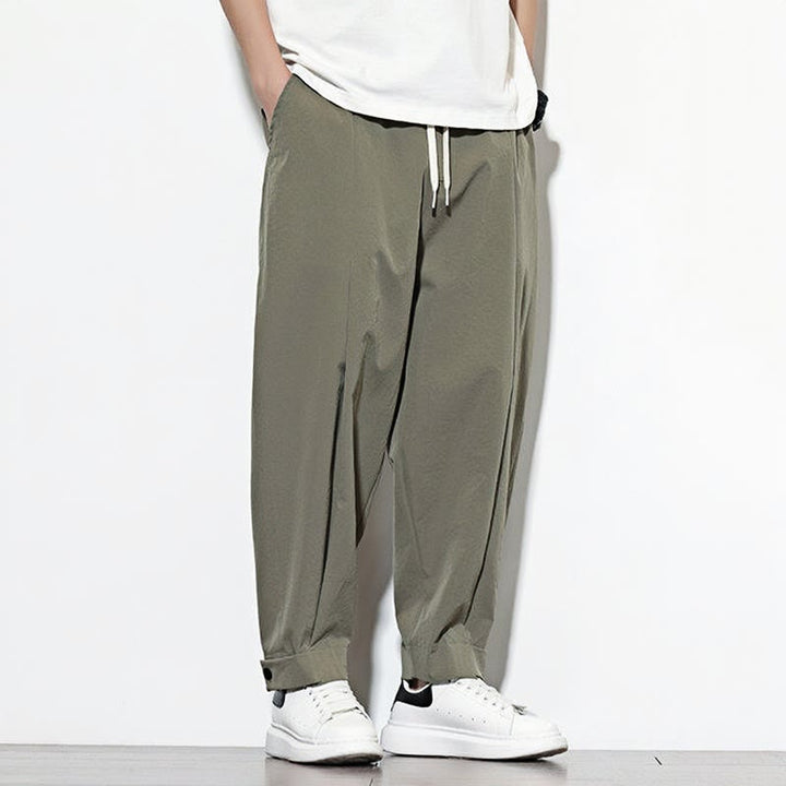 Pantalones harén casuales de color liso con cordón y bolsillos para hombre de Buddha Stones
