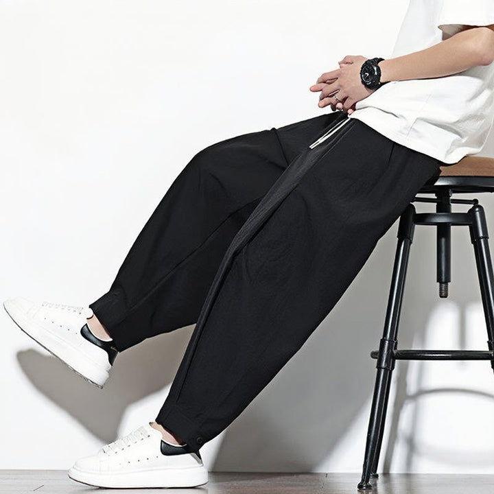 Pantalones harén casuales de color liso con cordón y bolsillos para hombre de Buddha Stones
