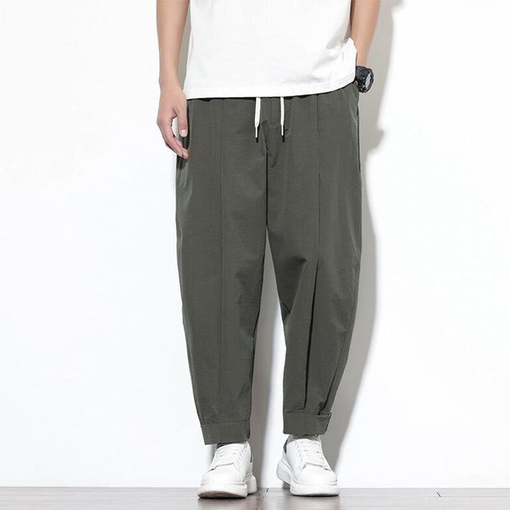 Pantalones harén casuales de color liso con cordón y bolsillos para hombre de Buddha Stones