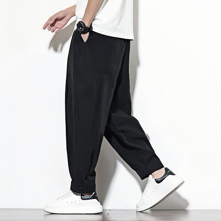 Pantalones harén casuales de color liso con cordón y bolsillos para hombre de Buddha Stones