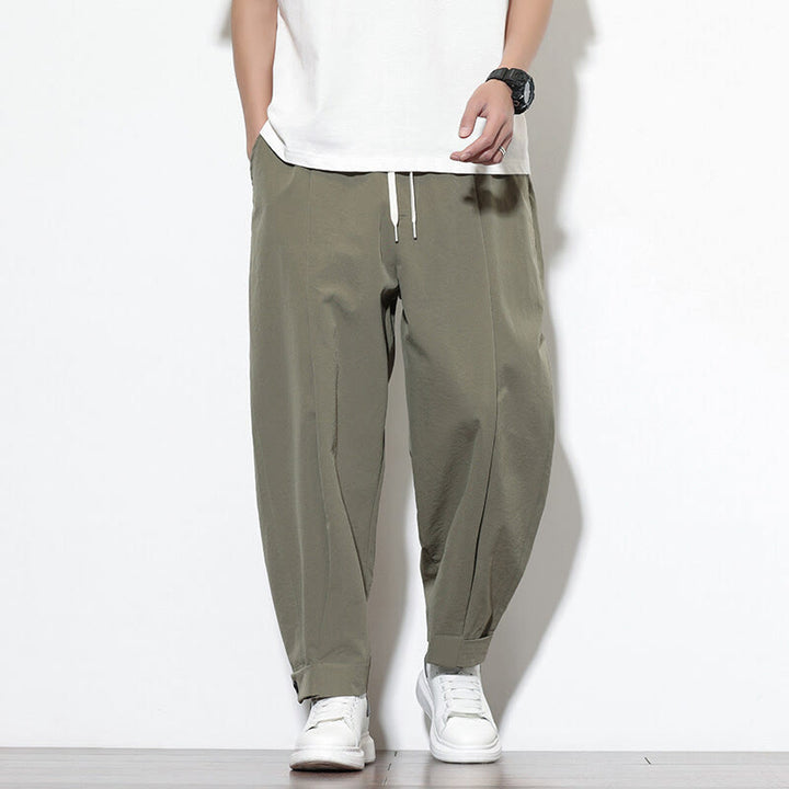 Pantalones harén casuales de color liso con cordón y bolsillos para hombre de Buddha Stones