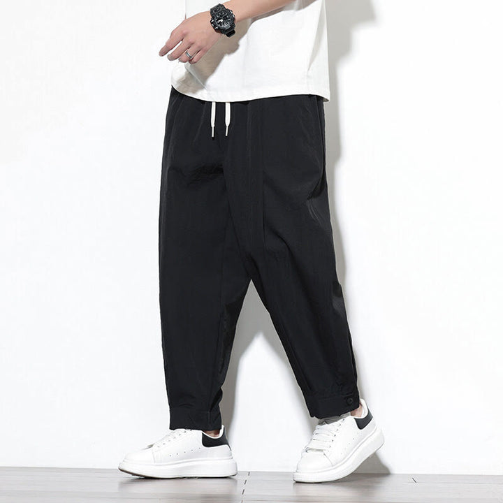 Pantalones harén casuales de color liso con cordón y bolsillos para hombre de Buddha Stones