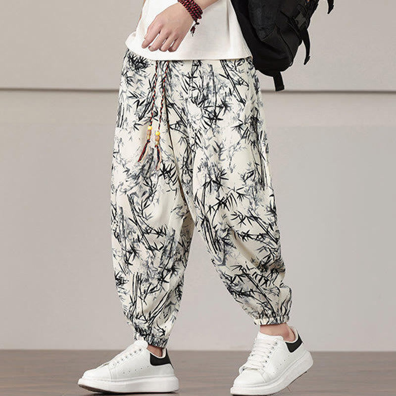 Pantalones harén con cordón y bolsillos para hombre con estampado de hojas de bambú y Buddha Stones