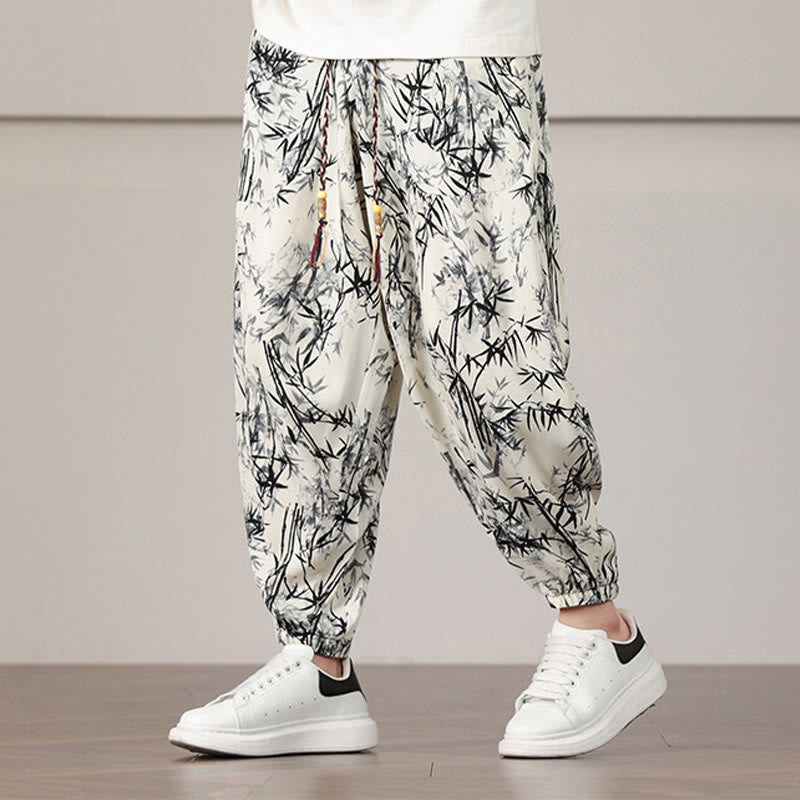 Pantalones harén con cordón y bolsillos para hombre con estampado de hojas de bambú y Buddha Stones